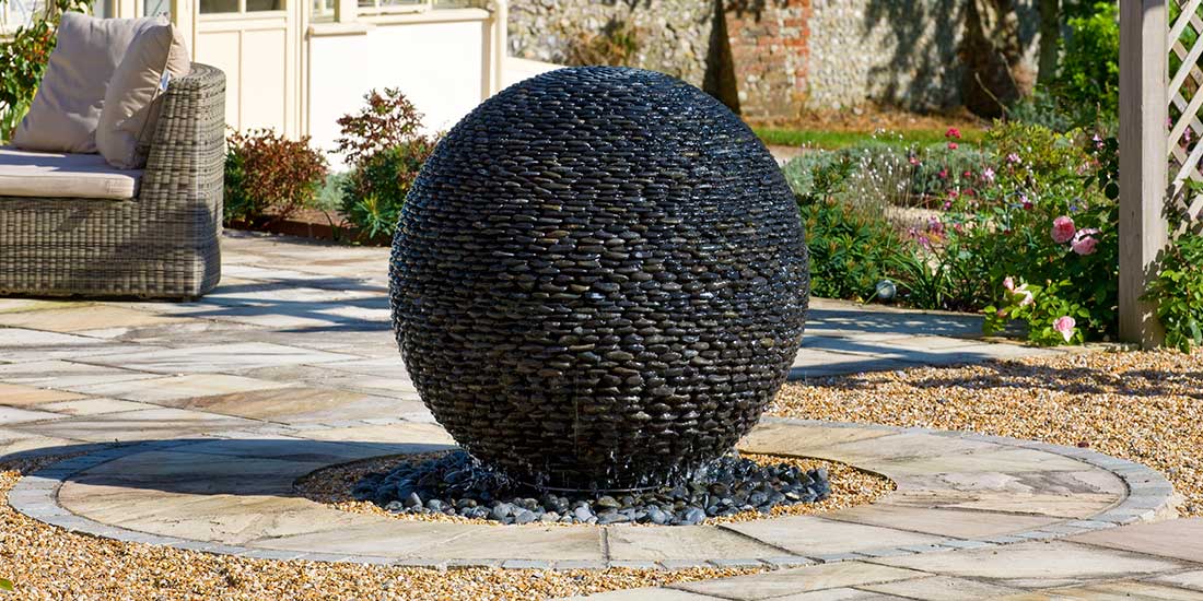 Stone Sphere Water Feature | Water Fountain Ball of Black Pebbles